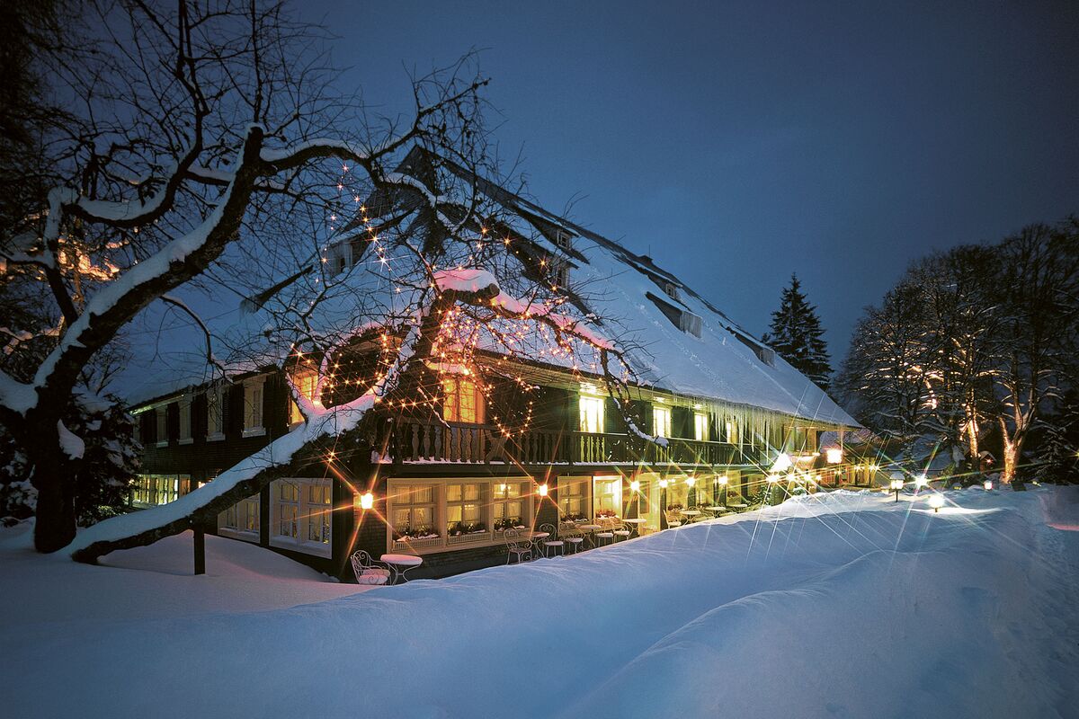 Black Forest house in winter by night