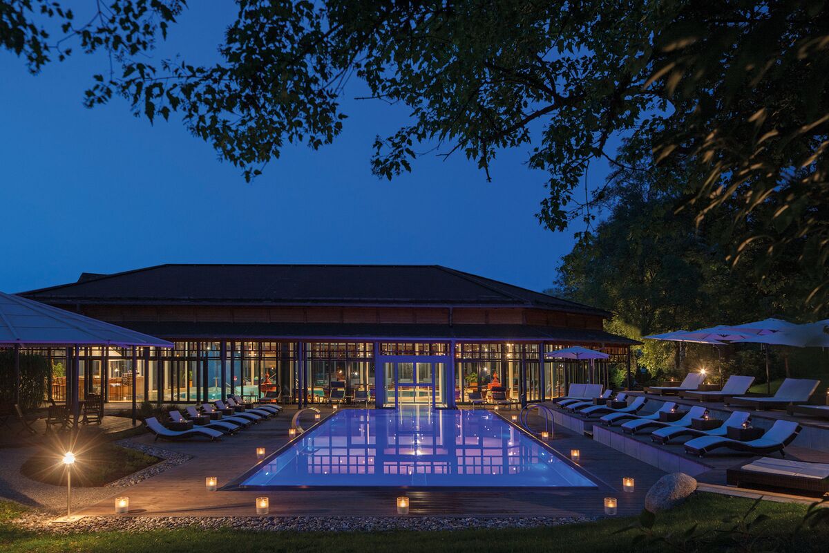 Illuminated outdoor pool at night