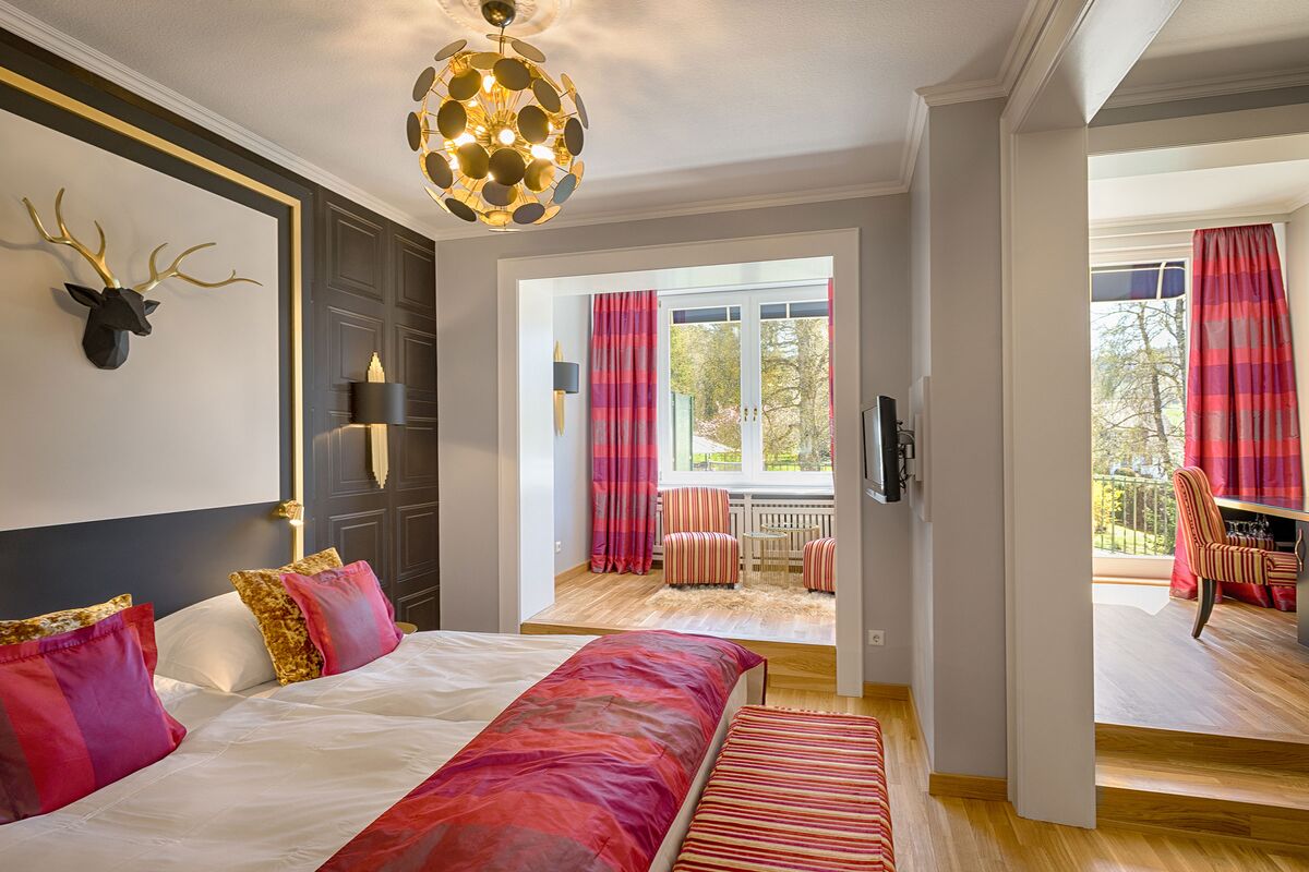 Family suite with red and gold accents